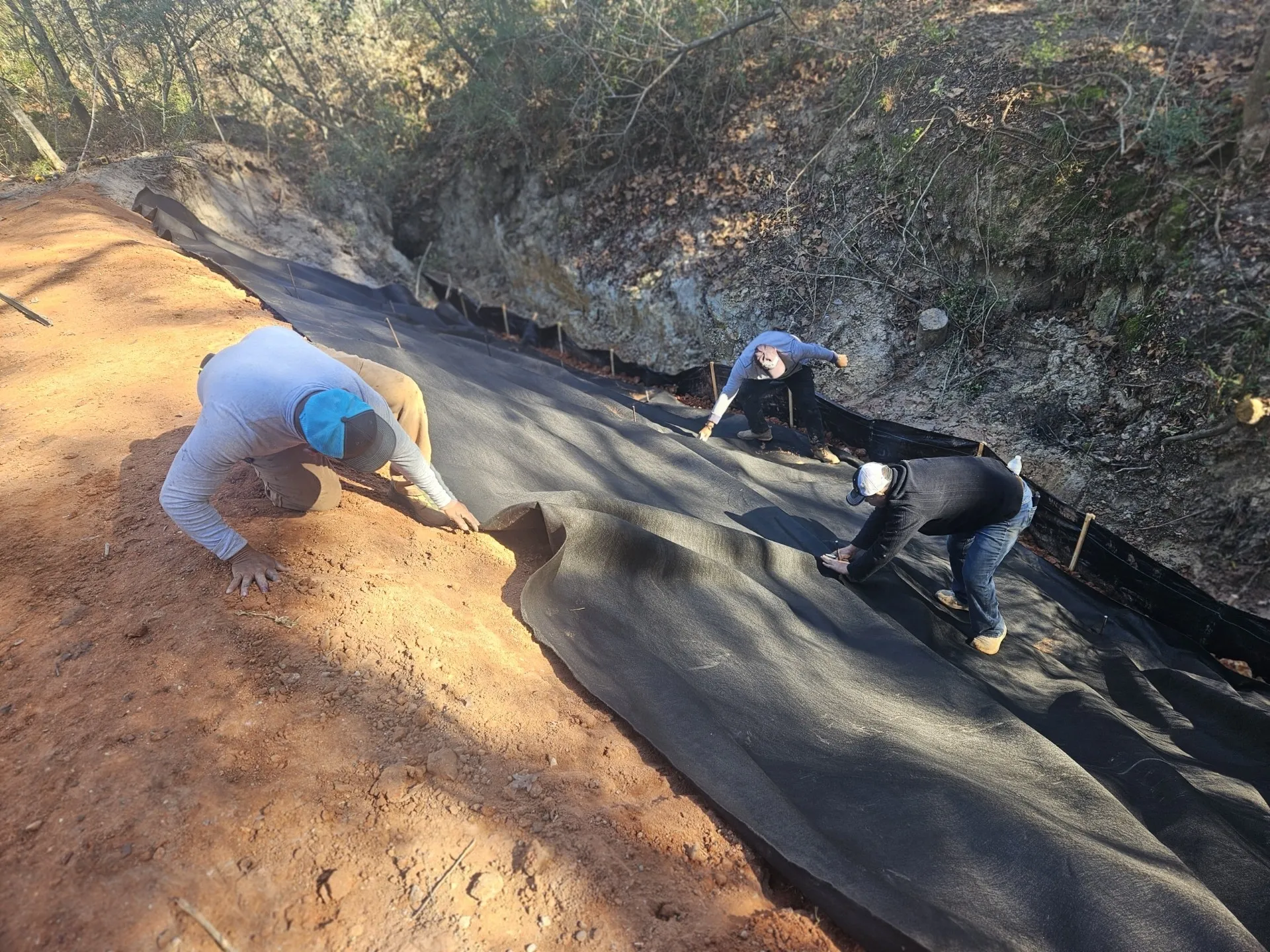 Mid-project — slope lined with erosion pavers